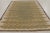 Hand-knotted in wool, this 8x10 Art Deco rug showcases a plush high-low texture with an earthy sage green center framed by...