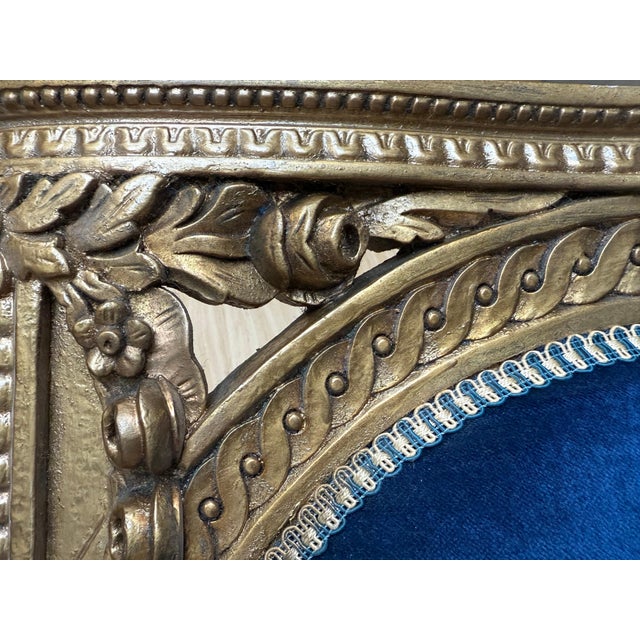 Louis XVI style armchair with medallion backrest. Elegantly carved and hand finished in a two tone patina, gilded or ecru,...