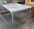Fantastic vintage side table features a chrome base with a marble top with gray marbling. See our other listings for...