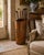 A distinctive late-19th-century French grain bin or utility vessel constructed from wood and wrapped in richly patinated...