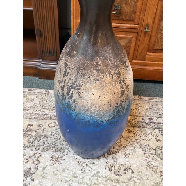 Design Plus Gallery presents an Elongated Ombre Vase. It is made of ceramic pottery with abstract illustration in very...