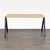 This Bernhardt desk features a simple and modern design with a light laminate wood top and sturdy black metal legs. Its...
