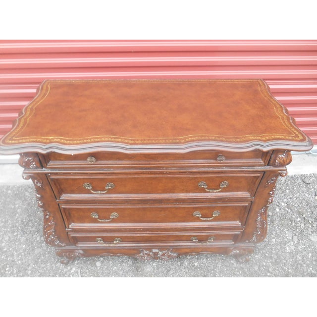 I have a Gorgeous Vintage Hi-Quality Designer Four Drawer Bombay Chest With Hand Tooled Leather Top. This chest is in...