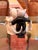 A delightfully sweet and highly collectible vintage ceramic novelty teapot featuring an anthropomorphic feline bride and...