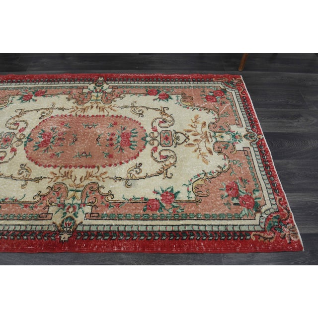 Vintage Hand-Knotted area rug is a semi-antique vintage area rug. The '70s Eastern region of Anatolia's unique rug is...
