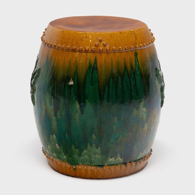 Drenched in color, this ceramic garden drum is drip glazed in the manner of ancient Chinese sancai ware, cloaked in...