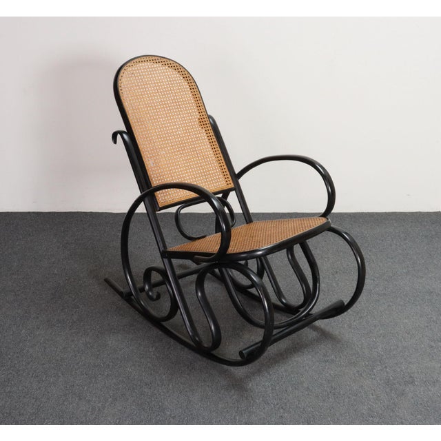 Iconic, ca. 1920s Thonet rocking chair Model #10 (in 1923, Thonet was forced to merge with Kohn-Mundus to form Mundus-...