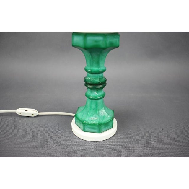 Elegant vintage table lamp produced in Czechoslovakia during the 1970s by Kamenický Šenov. The piece combines a sculptural...