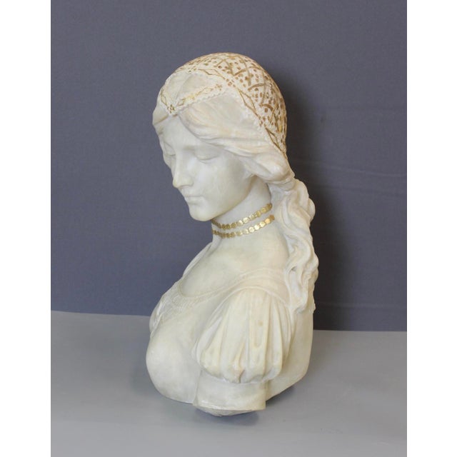 Important alabaster bust of a young woman, Art Nouveau period, with gilt headdress and necklace, unsigned, probably...