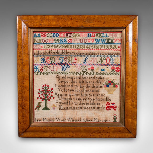 This is an antique needlepoint sampler. An English, handmade embroidered decorative panel, dating to the early Victorian...