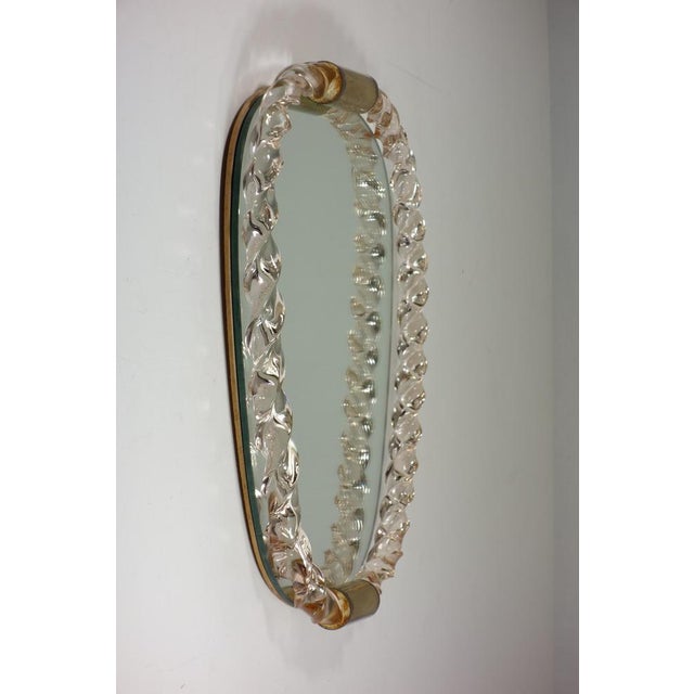 Wall Mirror Seguso Italy, 1930 Pink twister murano glass and brass details Excellent condiction just a small chip (look at...