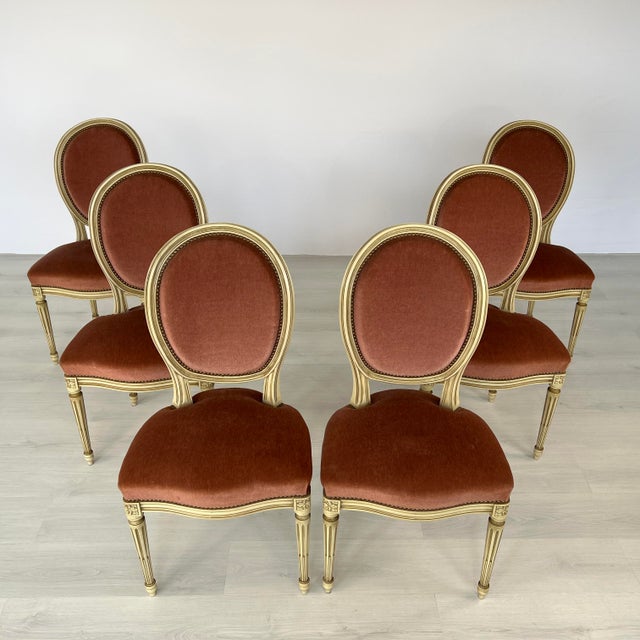 Dimensions: H 37” x W 18.3” x D 19.5” x SH 19” Set of 6 French Louis XVI style Medallion back dining chairs. Upholstered...