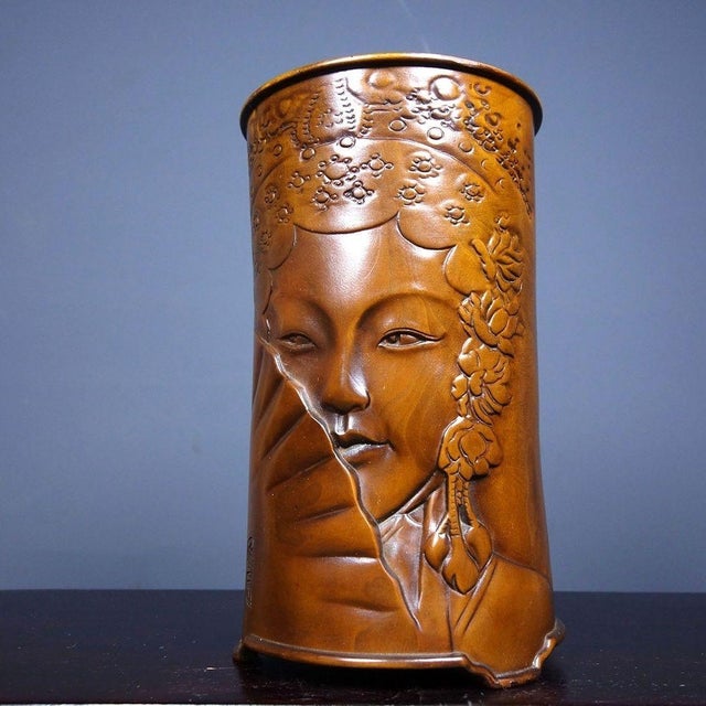 This is a finely carved antique boxwood brush pot (bitong), a traditional desk accessory used by scholars to hold writing...