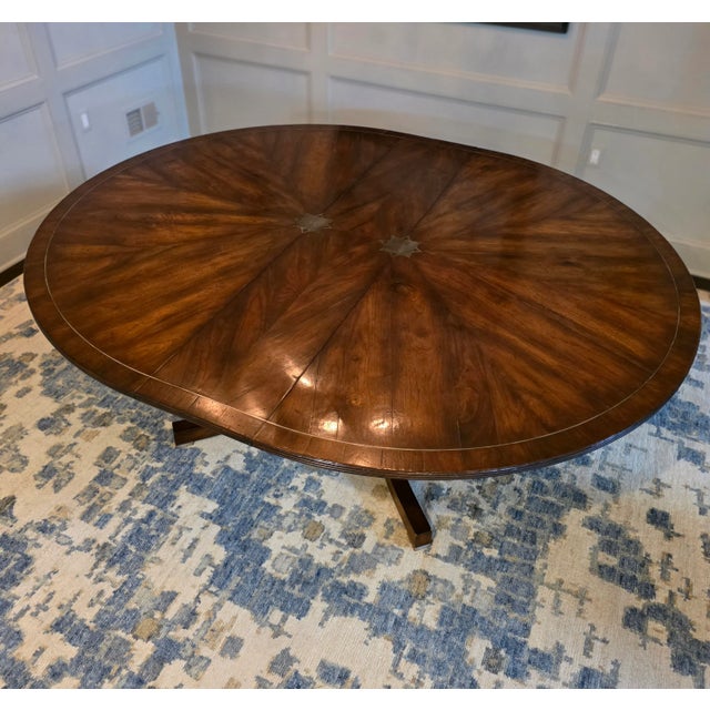 Fabulous New Classics dining table through Holly Hunt. Beautiful solid walnut table with a starburst layout with 1/8"...