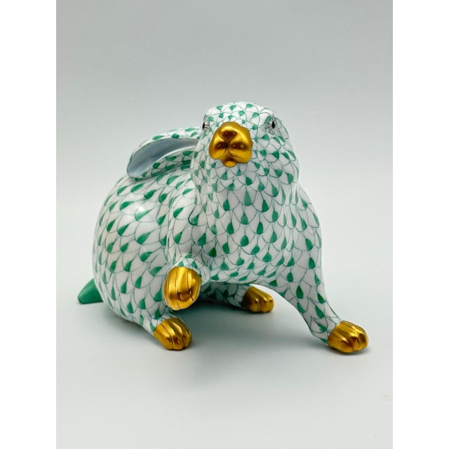 This Herend Green Fishnet Figurine with Gold Detail is a beautiful estate find measuring approximately 4.25" in height....