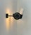 Pair of adjustable wall lights, each with a metal frame and an opaline glass diffuser, produced in France in the 1980s....