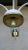 Nice Retro Vintage Chandelier. It has a white holder with bronze accessories of golden color. 3 light elements made of...