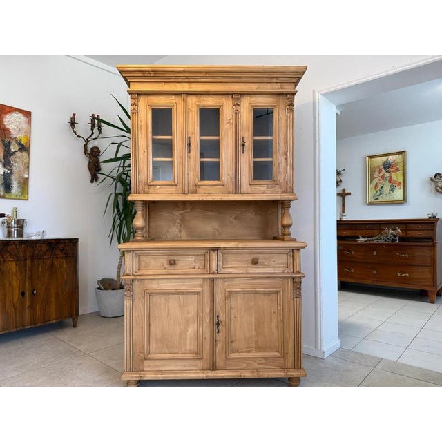 An enchanting Wilhelminian-era kitchen sideboard. This exquisite kitchen sideboard embodies the timelessness of antique...