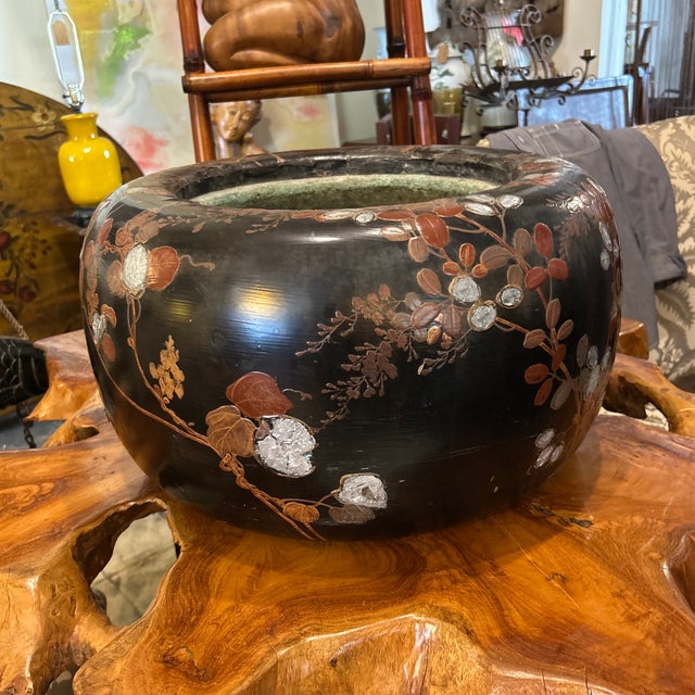 Exceptional large Japanese hibachi crafted in wood and hand decorated in art nouveau floral designs with a bronze face as...