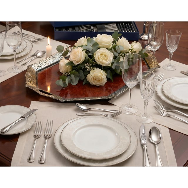 An elegant Dutch serving tray by Hooijkaas, crafted with a finely pierced 835 silver gallery and a rich mahogany center —...