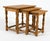 Grouping of (3) solid oak nesting tables in the design attributed to Henning Kjaernulf (1911-1975). Unmarked. Made in...