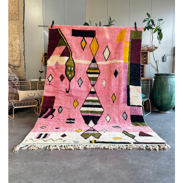 This expressive Moroccan Boujad rug was handwoven in the Middle Atlas region using natural wool. Boujad rugs are...