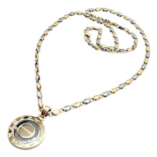 1970s Bulgari Zodiac Pendant Yellow Gold Steel Diamond Necklace For Sale