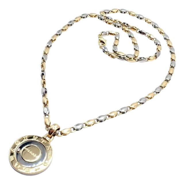 1970s Bulgari Zodiac Pendant Yellow Gold Steel Diamond Necklace For Sale