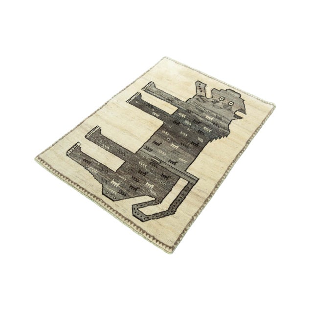 A real character carpet: This hand-knotted Gabbeh nomad rug is not only a handcrafted work of art, but also an expression...