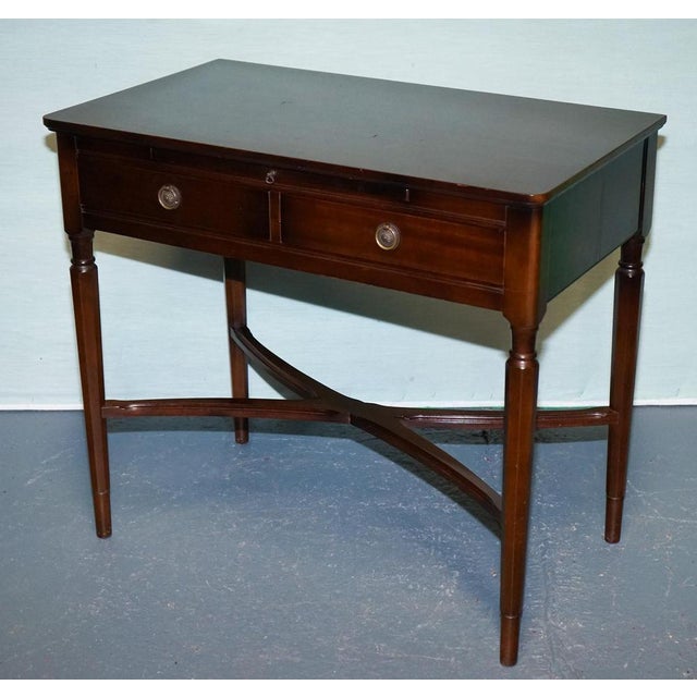 Antiques of London Discover this beautifully preserved Strongbow Furniture hardwood game table or writing desk,...
