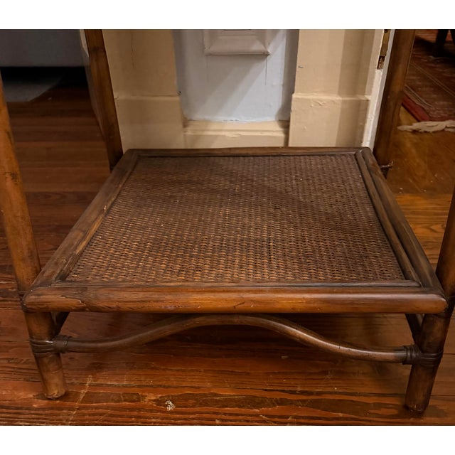 Beautiful split-reed rattan and burnt bamboo étagère shelving unit, crafted in Indonesia. Perfect for a coastal, bohemian,...