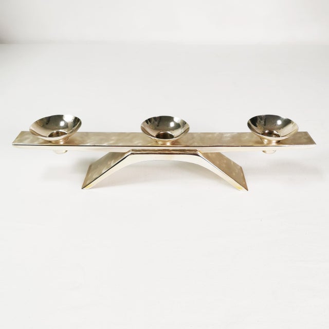 Candlestick manufactured by WMF, designed by Kurt Radke, Germany, 1960s - signed. It is characterized by a modernist form....