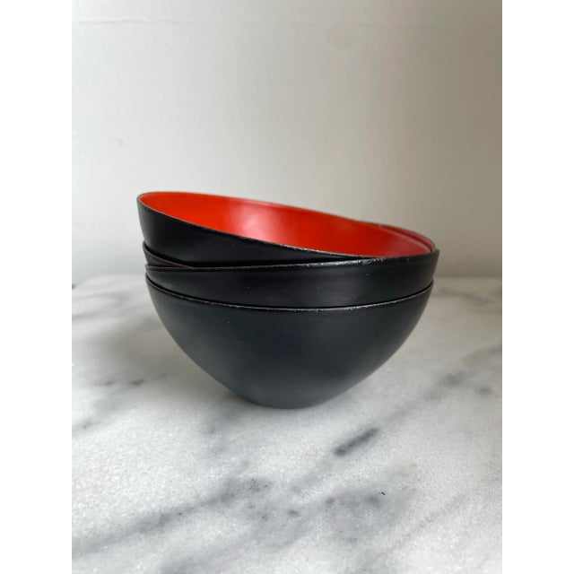Set of 4 bowls in metal and orange enamel. Designed by Herbert Krenchel and made by Torben Ørskov. Great original...