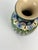 This small French faience vase attributed to a maker in the Longwy region dates from the early 20th century and presents a...