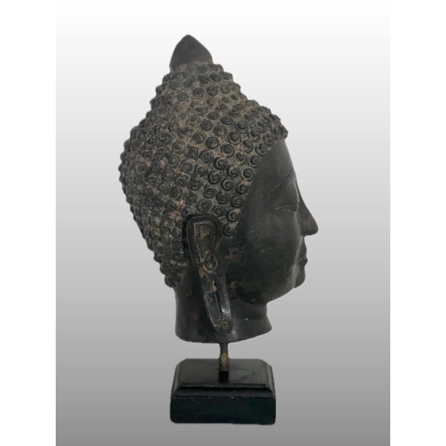 Antique South East Asian, Thai hollow cast bronze Buddha head sculpture, styled after the Sukhothai or Ayutthaya periods....