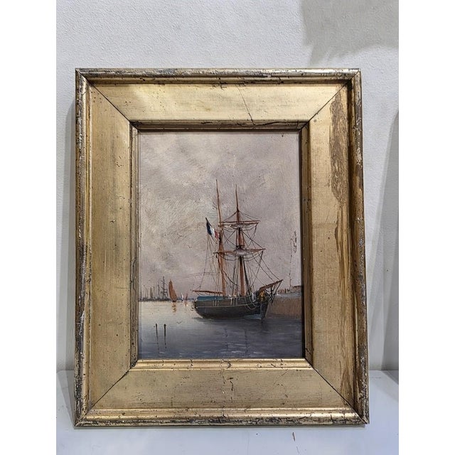 Pair of small seascapes, oil on panel. French school, late 19th century, early 20th century, depicting boats at the quayside.