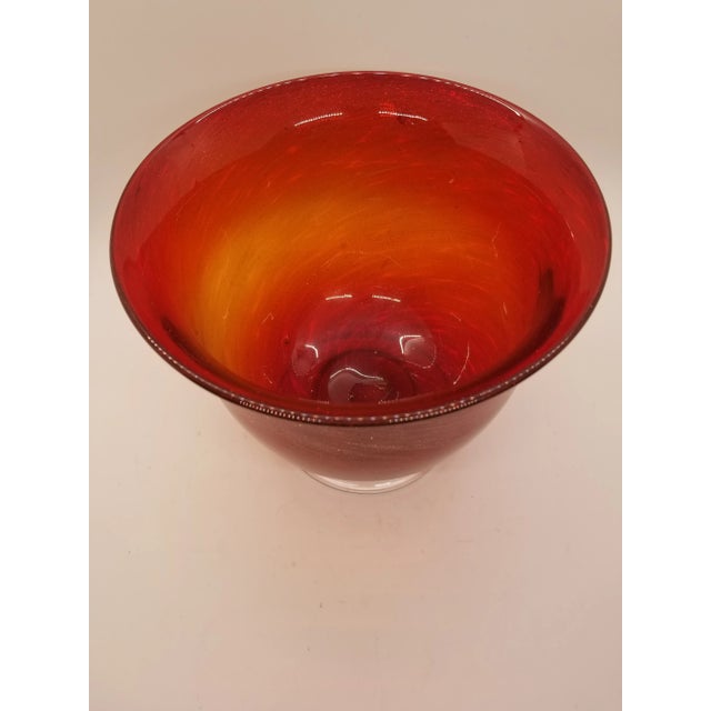 A Vintage Footed Cranberry Glass Bowl With Gold Swirls..excellent for special events.