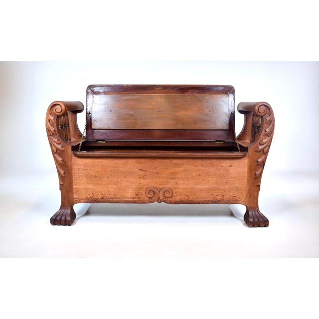 Late 19th C. custom quarter sawn select board White Oak storage bench with scroll arms and turned spindles embellished...