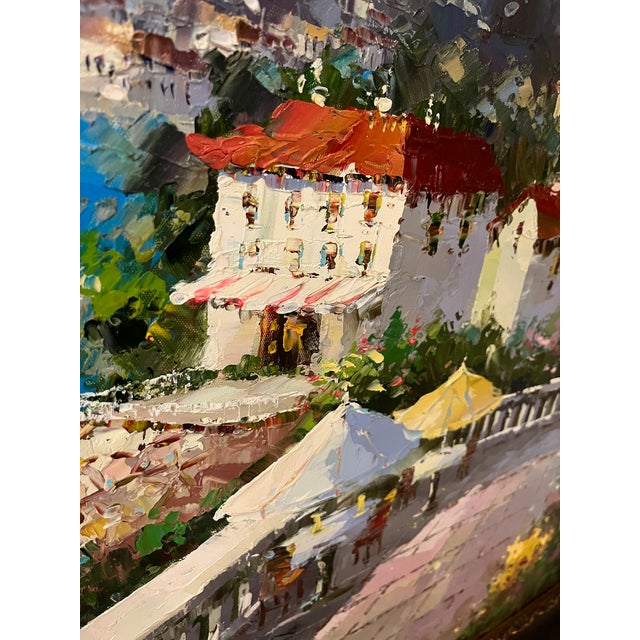 This striking, signed, large oil painting captures the beauty of the Mediterranean coast with a masterful balance of color...