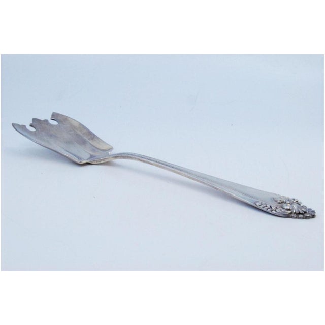 Silver Spaghetti Spoon with Reliefs, in Very Good conditions. Designed 1920 to 1949 This piece has an attribution mark, I...
