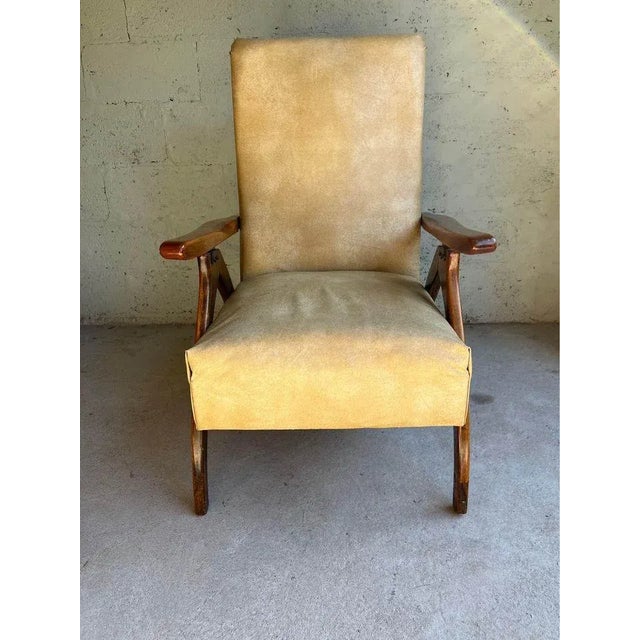 Mid Century Walnut Vinyl Recliner Armchair. Unmarked but well made Solid wood frame, sturdy and comfortable Vinyl is...