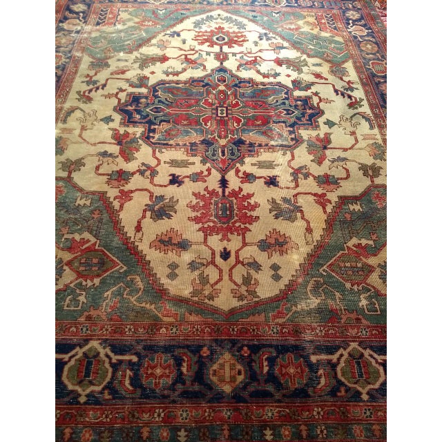 Late 19th Century Heriz Serapi Room Size Rug in a highly desirable "near square" size in pale yellow and green colors....