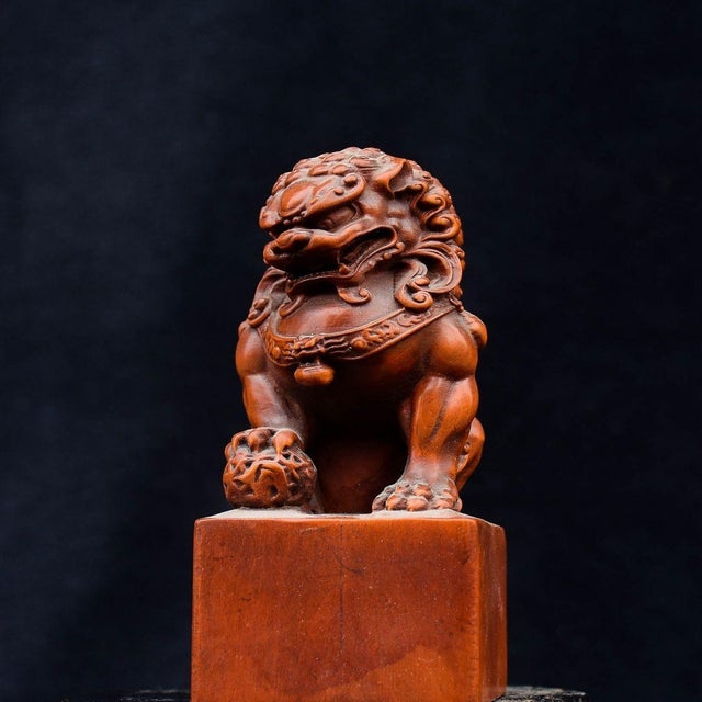 This is a charming vintage boxwood carved figure of a guardian lion, also known as a Foo Dog, traditionally used as a...