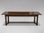 Imposing 19th Century Country French Provincial Farmhouse Dining Table This stunning dining table is crafted from solid...