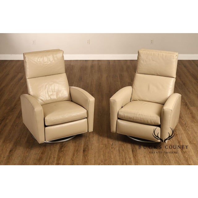 High Quality American Made Pair of Contemporary Leather Lounge Chairs With Integrated Reclining Backs and Smooth Swivel...
