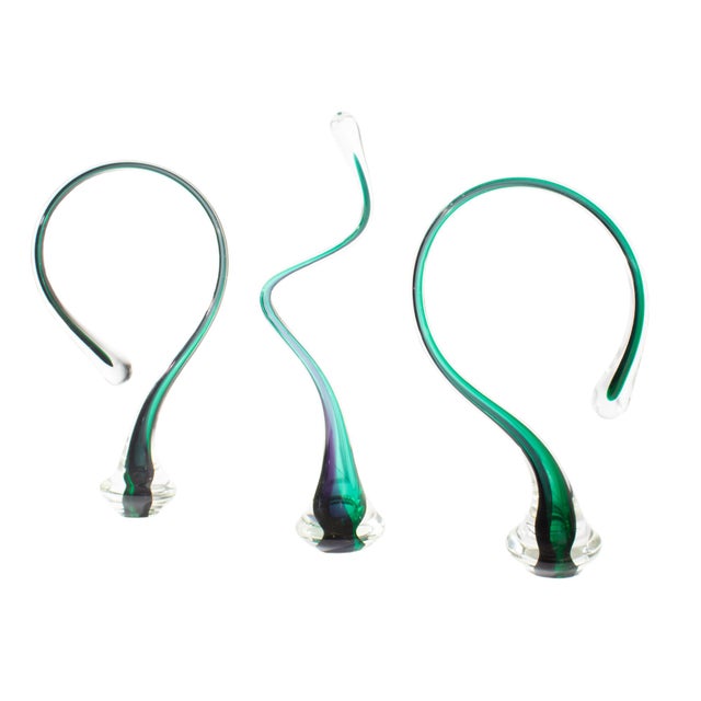 A 1993 art glass sculpture by the American artist William Neudek (1957-2020). This work consists of three curving glass...