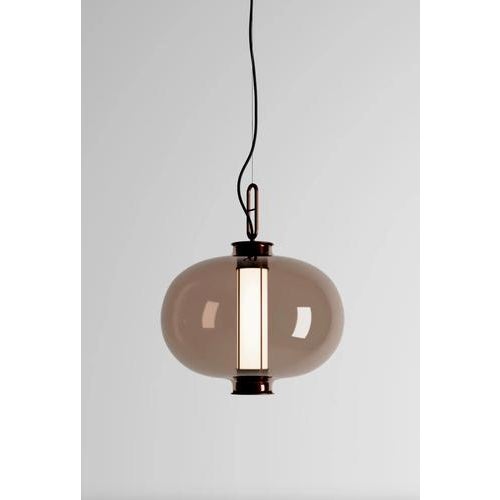 Neri and hu bai t ba ba bronze- amber glass diffuser suspension lamp for parachilna this collection is inspired by...