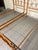 Pair of single beds from the 1960s in orange painted iron, original color and brass details. Healthy structure, heavy...
