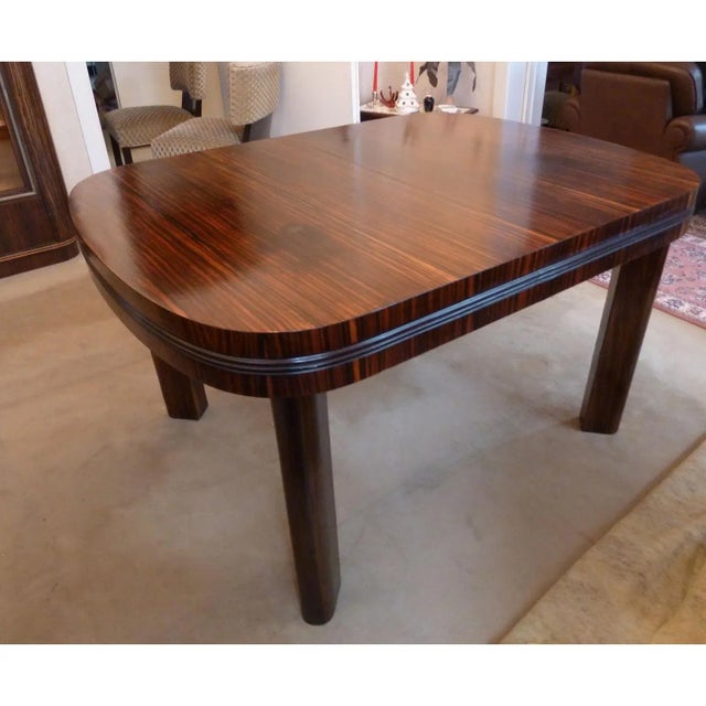 Art Deco dining table veneered in Makassar. Designed by Bruno Paul, Germany, circa 1930. Extendable in two dimensions (180...