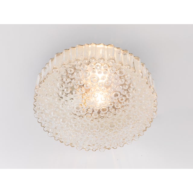 Beautiful bubble glass flush mount or wall sconce from the 1960s. Designed by Staff Leuchten Germany. In great condition,...